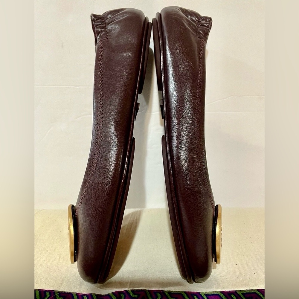 Tory Burch Women's Burgundy  Flats with Gold Emblem. - Picture 8 of 16
